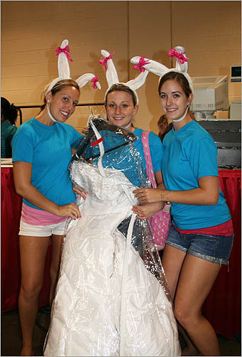 Kara Brunell (middle) purchased a strapless Moonlight gown after trying on only four dresses.