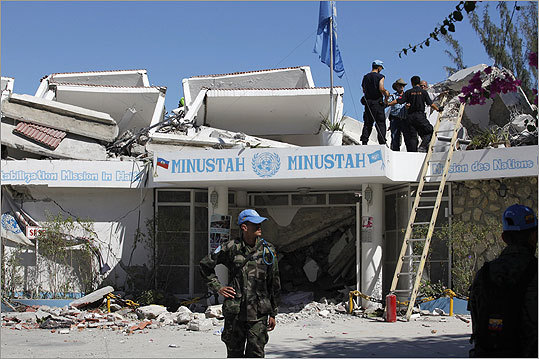 Another view of the United Nations Stabilization Mission building. The UN said five people were killed in the building's collapse and more than 100 are missing, including the mission chief.