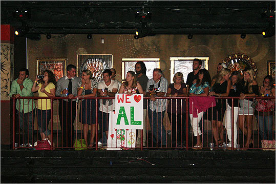 Fans of competitor Alison L. held up a supportive sign on the second floor balcony.