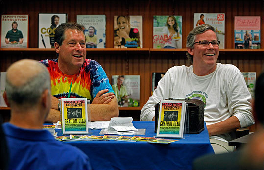 In their new book, 'Marketing Lessons from the Grateful Dead,' co-authors and marketing gurus David Meerman Scott (left) and Brian Halligan (right) - shown here at an event Monday at a Barnes & Noble in Burlington - detail how the band stumbled into an innovative business model that turned out to be nearly as noteworthy as its music. Here are eight of the business and marketing lessons learned from the Grateful Dead detailed in the book. Source: 'Marketing Lessons from the Grateful Dead'