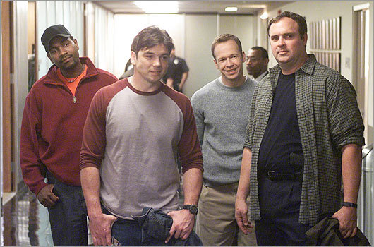 The 2002 NBC series 'Boomtown' also found Wahlberg in the role of detective. Here, he's pictured in the pilot episode with costars, from left, Mykelti Williamson, Jason Gedrick, and Gary Basaraba.