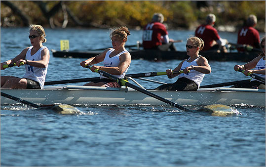 Members of the Blue Goose Boat Club from Bates College in Lewiston, Maine, competed in the Alumnae Women's Eights category.