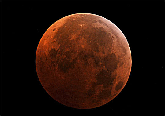 The moon appeared red during the peak of the eclipse in Virginia.