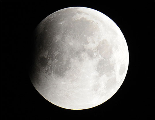 The moon is usually lit by the sun. During an eclipse, the Earth is aligned between the full moon and the sun, covering the lunar surface in shadow. The shadow of the Earth was seen on the moon at the start of a total lunar eclipse over Scotland.