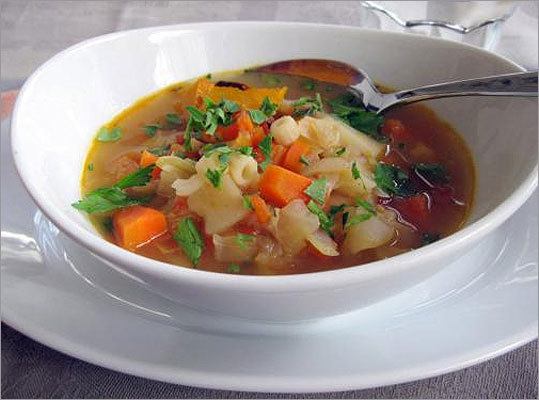 Turkey-vegetable soup Serves 4 Ingredients Vegetable oil, carrots, onion, salt and pepper, cauliflower, cabbage, canned tomatoes, water, chicken stock, bone from cooked turkey breast, tiny soup pasta (ditalini, shells, flakes), cooked vegetables, fresh parsley. (Full measurements, recipe)