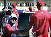 David Ortiz (left) talked with Cardinals slugger Albert Pujols