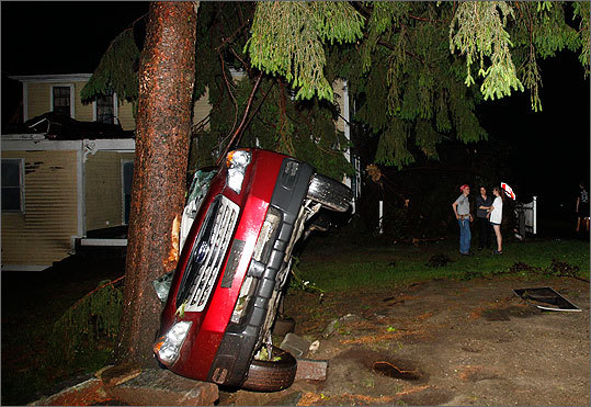 Car smashed against tree