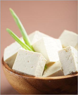 Soy products Eat four servings a day; each serving is equivalent to 4 ounces of firm tofu, 1 cup of soy milk, 1/2 cup of soybeans, 3/4 cup of soy yogurt, or 1/3 cup roasted soy nuts.