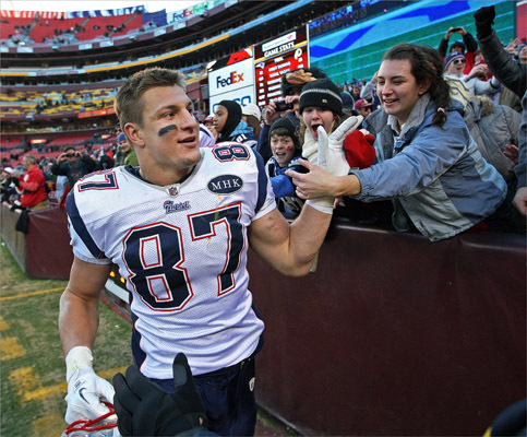 Patriots tight end Rob Gronkowski, who with his first touchdown catch of the game set the NFL record for most touchdown passses caught by a tight end in a season, got a welcome reception from some fans as he left the field following the game. He finished the game with two touchdowns and 160 yards.