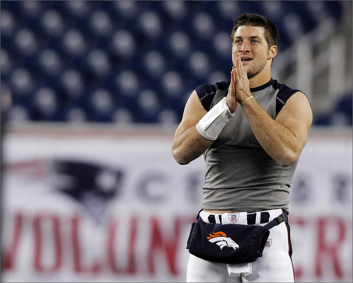 Denver Broncos quarterback Tim Tebow waited to warm up before an NFL divisional playoff football game between the Denver Broncos and New England Patriots on Jan. 14 in Foxborough.