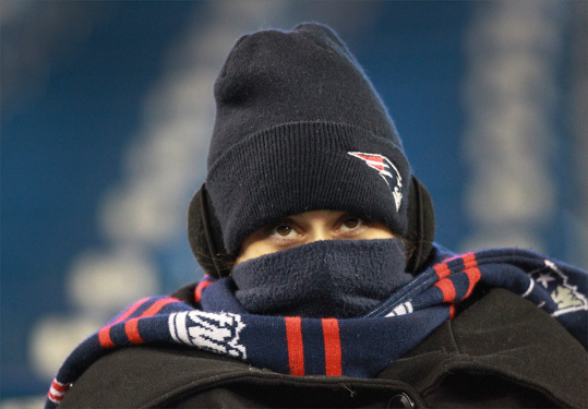 Face masks and hats were the order of the day for New England Patriots fans attending tonight's game.