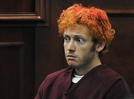 The Colorado movie theater shooting suspect showed little emotion as he made his first court appearance with reddish orange hair. James Holmes was wide-eyed, frowning and unshaven as he sat staring down. At one point he closed his eyes as a judge spoke. Authorities say the 24-year-old former graduate student is refusing to cooperate and it could take months to learn what prompted the horrific attack. Holmes has been held in solitary confinement since Friday. Certain traits emerge time and time again within the backgrounds and biographies of these assailants. Read more.