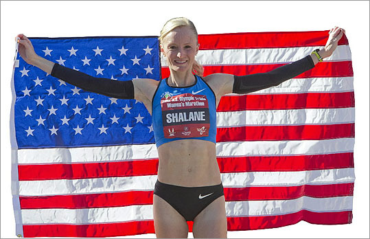 Shalane Flanagan posed with the American flag after winning the US Marathon Olympic Trials Women's Division in 2:25:38 on Jan. 14 in Houston.