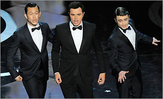 From left: Actors Joseph Gordon-Levitt, host Seth MacFarlane, and Daniel Radcliffe performed together at the Dolby Theatre in Los Angeles.
