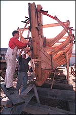 ESSEX: Harold Burnham follows 19th-century techniques as he constructs a vessel at the Shipbuilding Museum.