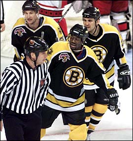 Anson Carter argues his point