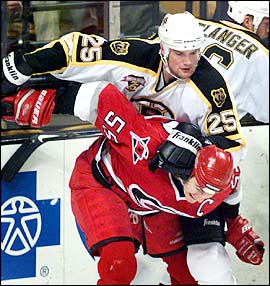 Hal Gill checks Keith Primeau