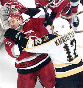 Dimitri Khristich gets physical