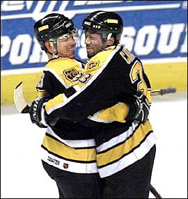 Anson Carter and Shawn Bates celebrate