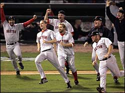 Sox players run onto the field to celebrate