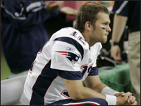 Patriots quarterback Tom Brady sat on the team bench during third quarter of the game against the Atlanta Falcons. The Patriots won 31 to 28 in Atlanta, GA. (Globe Staff Photo / John Bohn)