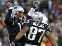 Patriots quarterback Tom Brady celebrated with wide receiver David Givens after the Patriots third touchdown of the game giving the Patriots a 21-0 lead going into halftime against Tampa Bay.  (Globe Staff Photo / Barry Chin)