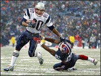 Patriots wide receiver Troy Brown left Bills cornerback Eric King in the dust as he headed for the end zone with a touchdown pass from Tom Brady. (Globe Staff Photo / Jim Davis) 