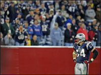 Patriots fans saluted linebacker Tedy Bruschi after he made his return to the Patriots' starting lineup. (Globe Staff Photo/Jim Davis)