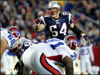Patriots linebacker Tedy Bruschi, in his role as a defensive captain, called out a coverage on a first quarter play. The October 30, 2005 game was Bruschi's first after his stroke in 2004. (Globe Staff Photo/Jim Davis) 