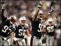 Patriots defensive end Richard Seymour lead the celebration after his team recovered a fumble. (Globe Staff Photo / Barry Chin)