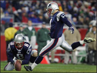 Kicker Adam Vinatieri (right) became the all-time leading Patriots scorer with a field goal out of the hold of teammate Josh Miller (left), surpassing Gino Cappeletti. (Globe Staff Photo / Jim Davis) 