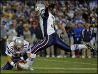 Stephen Gostkowski (3) out of the hold of his Matt Cassel (16) kicks the game winning field goal late in the foruth quarter that gave New England a 24-21 victory over the San Diego Chargers.