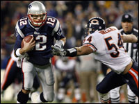 Tom Brady eludes Bears linebacker Brian Urlacher as he scrambled and picked up a key first down on a third and long in the fourth quarter. 