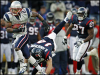 The last Texan to have a chance top stop the Patriots' Ellis Hobbs (27) on his 93 yard third quarter kickoff return for a touchdown was David Anderson (14), but his dive was to no avail.