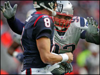  Richard Seymour putting defensive pressure on Houston Texans quarterback David Carr during second quarter action.