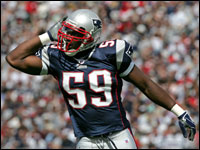 Rosevelt Colvin getting the fans pumped up during first quarter action against the Buffalo Bills. 