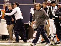 As the clock ran out on the Giants, New England Patriots head coach Bill Belichick heads out onto the field with a 16-0 season thus far.