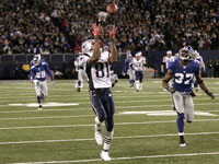 New England Patriots wide receiver Randy Moss makes his 2nd reception for a TD in the second half on a pass from Tom Brady, which broke the record formerly held by Colts QB Peyton Manning.