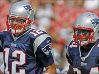 Patriots quarterback Tom Brady (left) and tight end Benjamin Watson (84, right) are all smiles in the fourth quarter of New England's 38-14 victory over the New York Jets.