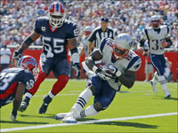 Patriots tight end Benjamin Watson (84) splits the Bills defense and scores a second quarter touchdown on an eight yard pass from Tom Brady (not pictured).