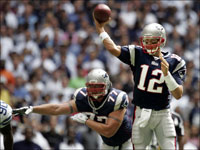 New England Patriots quarterback Tom Brady throws a pass with protection from teammate Nick Kaczur during the first quarter against the Dallas Cowboys in Week 6.