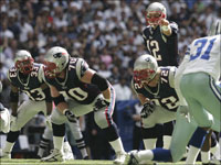 New England Patriots quarterback Tom Brady points out the defense coverage during the first quarter against the Dallas Cowboys in Week 6.