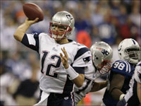 New England Patriots quarterback Tom Brady throws a 3-yard touchdown reception to Wes Welker during 4th quarter action against the Indianapolis Colts.