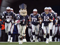 The New England Patriots take the field before they play the Washington Redskins at Gillette Stadium.