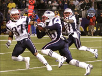 New England Patriots defensive back James Sanders makes a 4th quarter interception of a pass by Baltimore Ravens quarterback Kyle Boller.