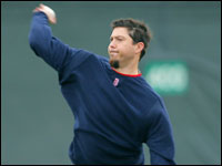 Red Sox pitcher Josh Beckett throws in the outfield this morning.   (Globe Staff Photo/ Jim Davis)