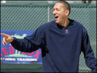 Red Sox pitcher Julian Tavarez has a laugh as he heads for a field to work out.   (Globe Staff Photo/ Jim Davis)