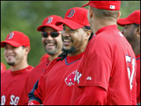 Manny Ramirez surprised everyone by showing up in camp early this morning. After he did some hiting in the indoor batting cages, he joined his teammates on the field, who greeted him with smiles all around.    (Globe Staff Photo/ Jim Davis)