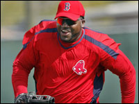 Red Sox DH David Ortiz (working out at firstbase) laughs as he races across the diamond while chasing a runner during a run down drill at today's practice.    (Globe Staff Photo/ Jim Davis)