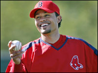 Red Sox centerfielder Coco Crisp arrived in camp today and seemed happy to be there.   (Globe Staff Photo/ Jim Davis)